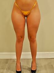 loving this gold shiny micro thong the front looks so good heels are awesome too
